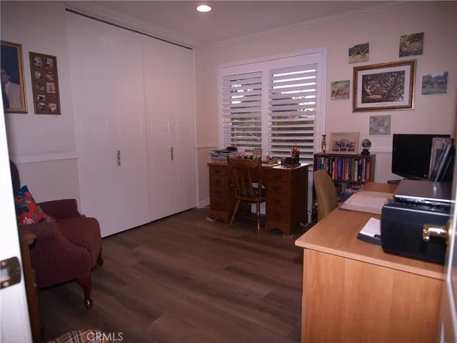 a view of a porch with potted plants