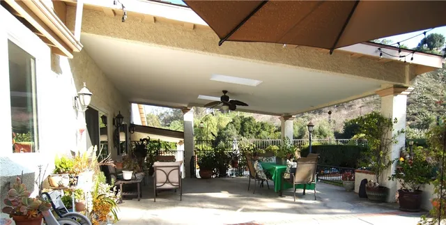a view of a swimming pool with lounge chair
