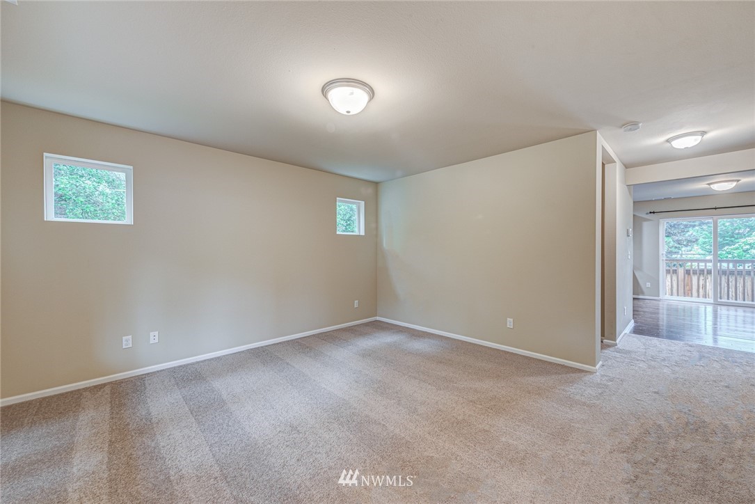 919 228th Street Southeast Bothell, WA 98021 - Photo 11 of 25 an empty room with windows