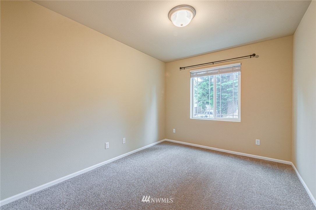 919 228th Street Southeast Bothell, WA 98021 - Photo 22 of 25 an empty room with windows
