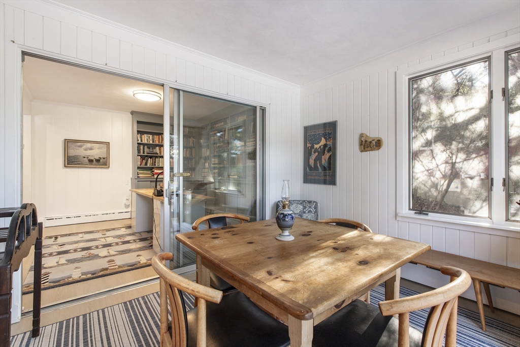 155 Paulson Road Newton, MA 02468 - Photo 13 of 33 a view of a dining table and chairs in a room