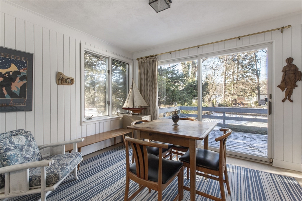 155 Paulson Road Newton, MA 02468 - Photo 14 of 33 a view of a dining room with furniture window and outside view