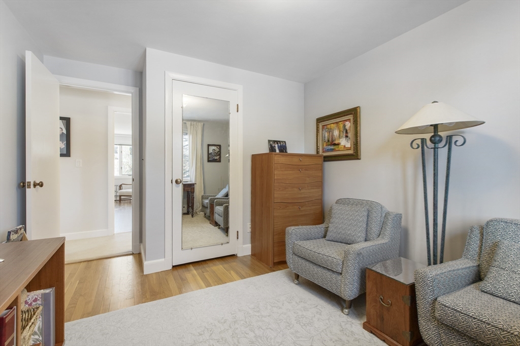 155 Paulson Road Newton, MA 02468 - Photo 20 of 33 a living room with furniture and a wooden floor