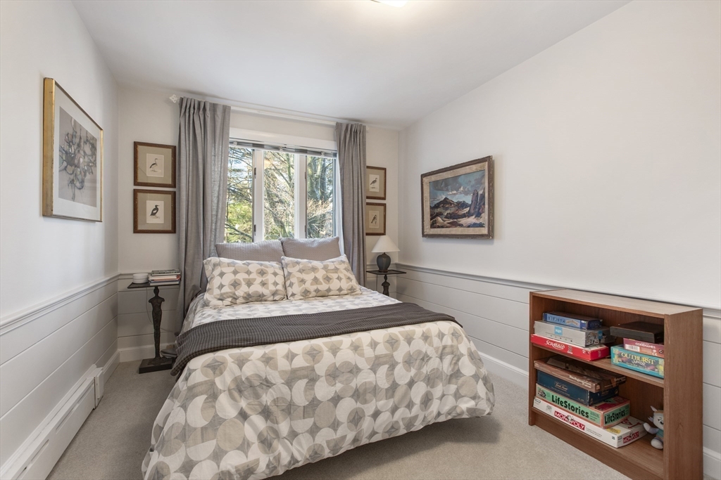 155 Paulson Road Newton, MA 02468 - Photo 24 of 33 a bedroom with a bed and a large window
