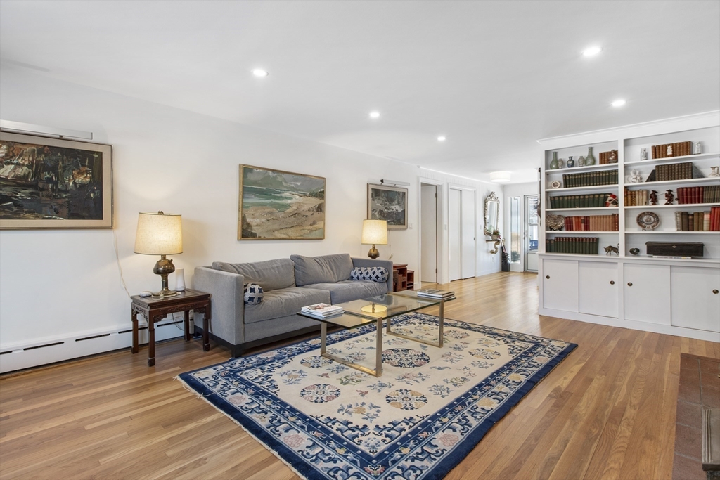 155 Paulson Road Newton, MA 02468 - Photo 5 of 33 a living room with furniture and a rug