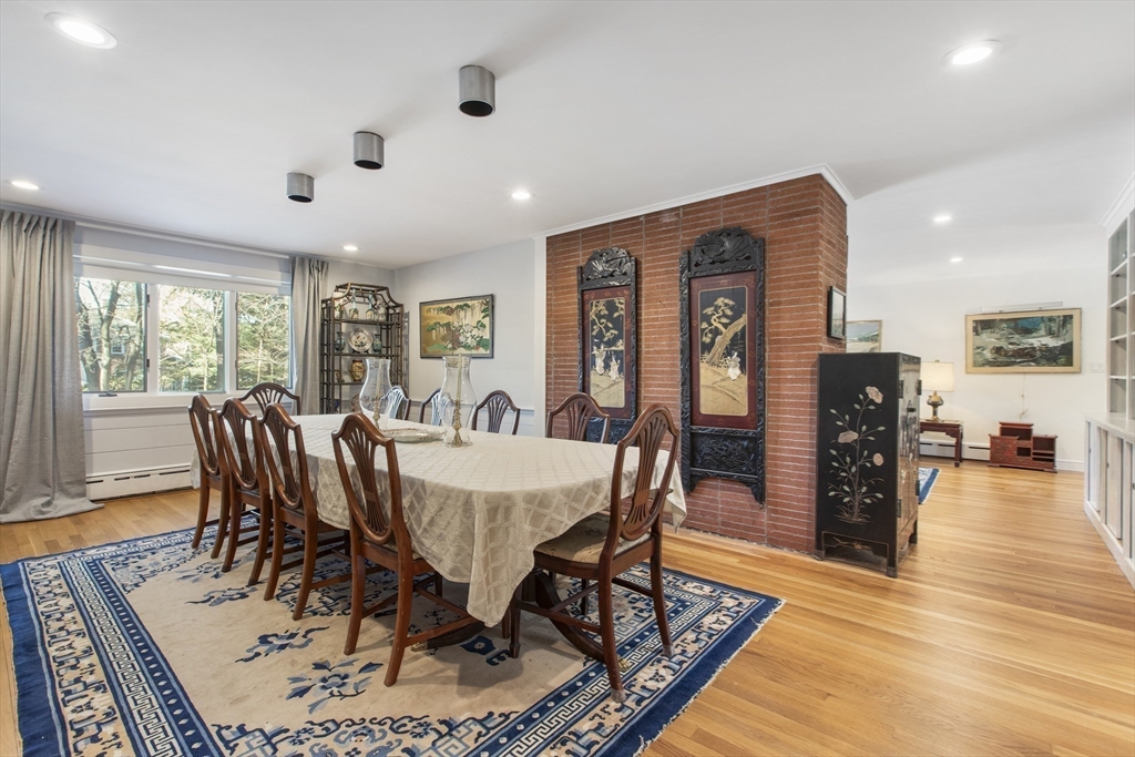 155 Paulson Road Newton, MA 02468 - Photo 8 of 33 a view of a a dining room with furniture window and wooden floor