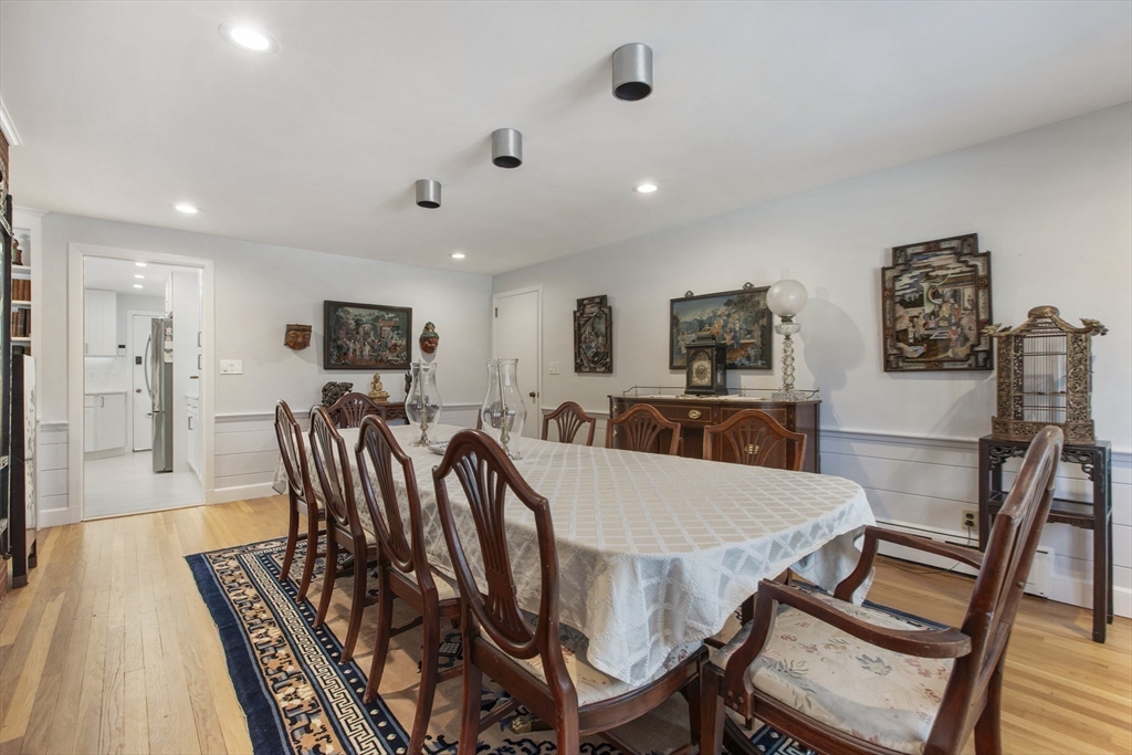 155 Paulson Road Newton, MA 02468 - Photo 9 of 33 a view of a dining room with furniture and wooden floor