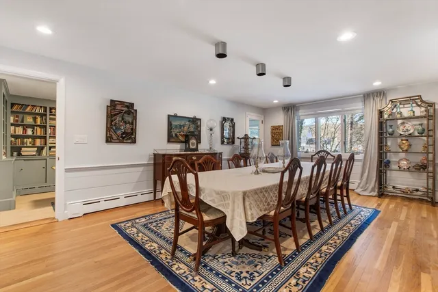 a room with furniture and book shelf