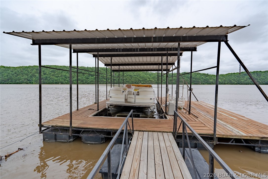 3135 Lick Creek Road Edwards, MO 65326 - Photo 3 of 94 12x30' dock slip (2008 22' pontoon sweetens the de