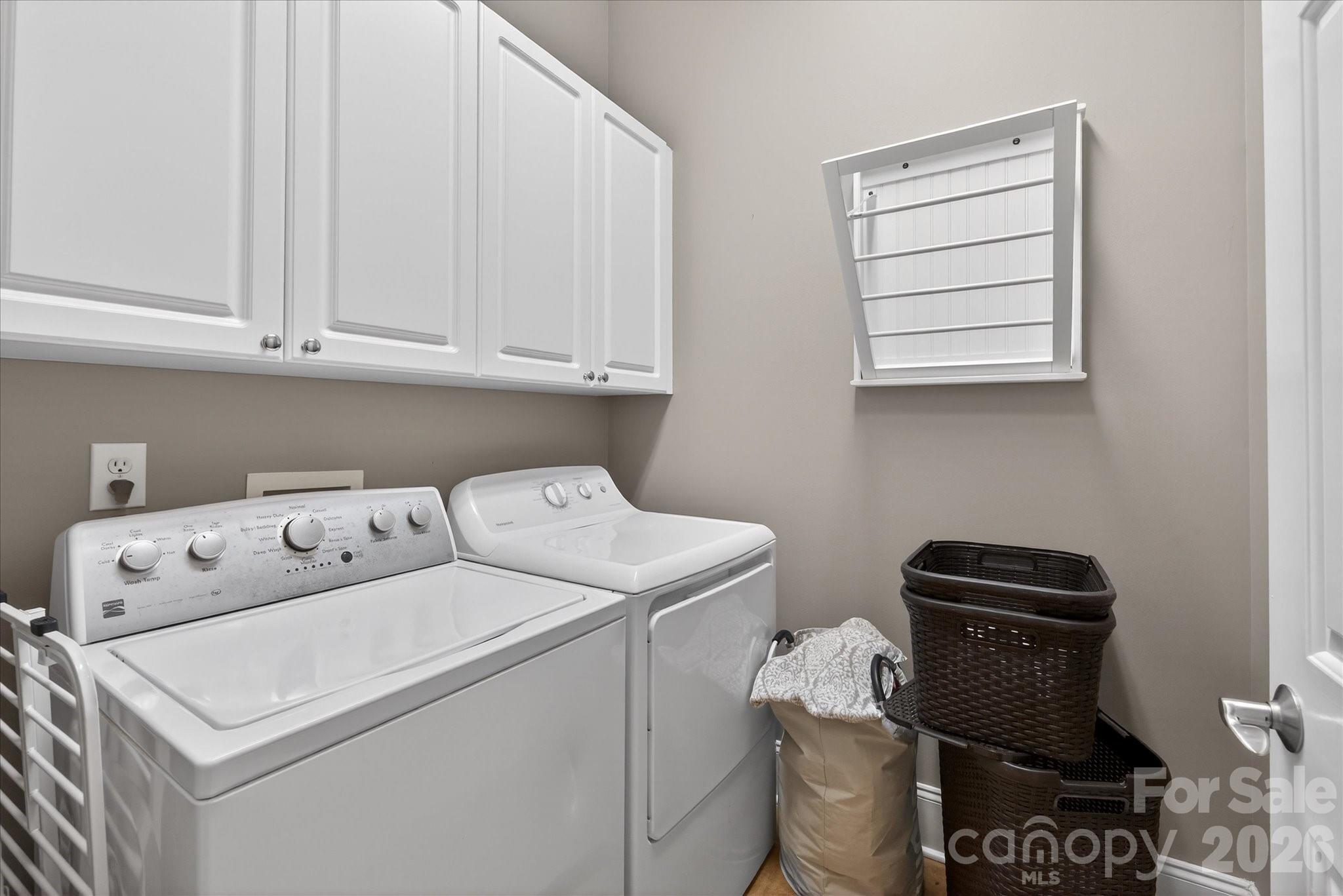 8811 1st Bloom Road Charlotte, NC 28277 - Photo 32 of 48 a utility room with dryer and washer