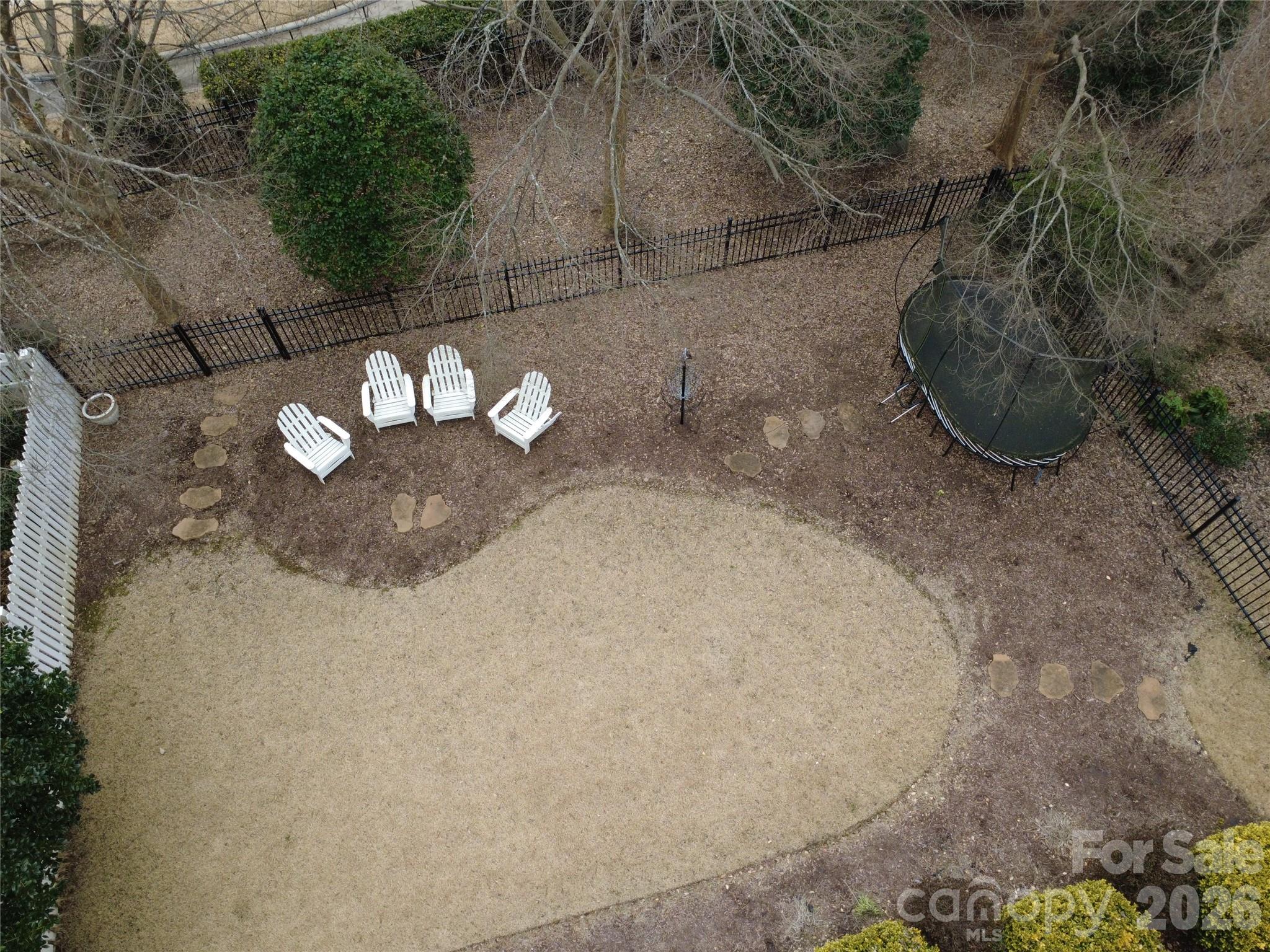 8811 1st Bloom Road Charlotte, NC 28277 - Photo 48 of 48 a view of a wooden floor with a fire pit