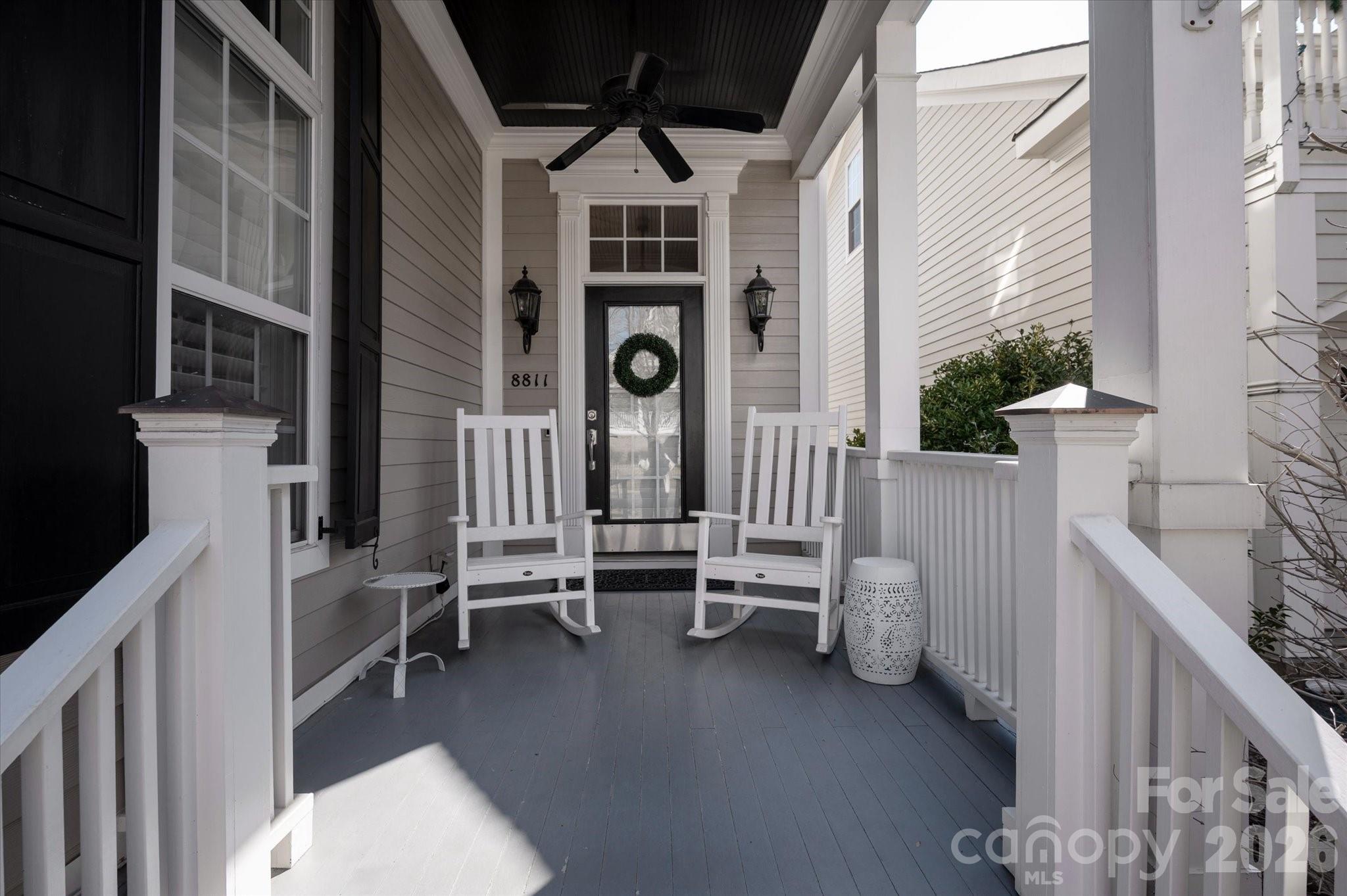 8811 1st Bloom Road Charlotte, NC 28277 - Photo 5 of 48 a view of table and chair in balcony