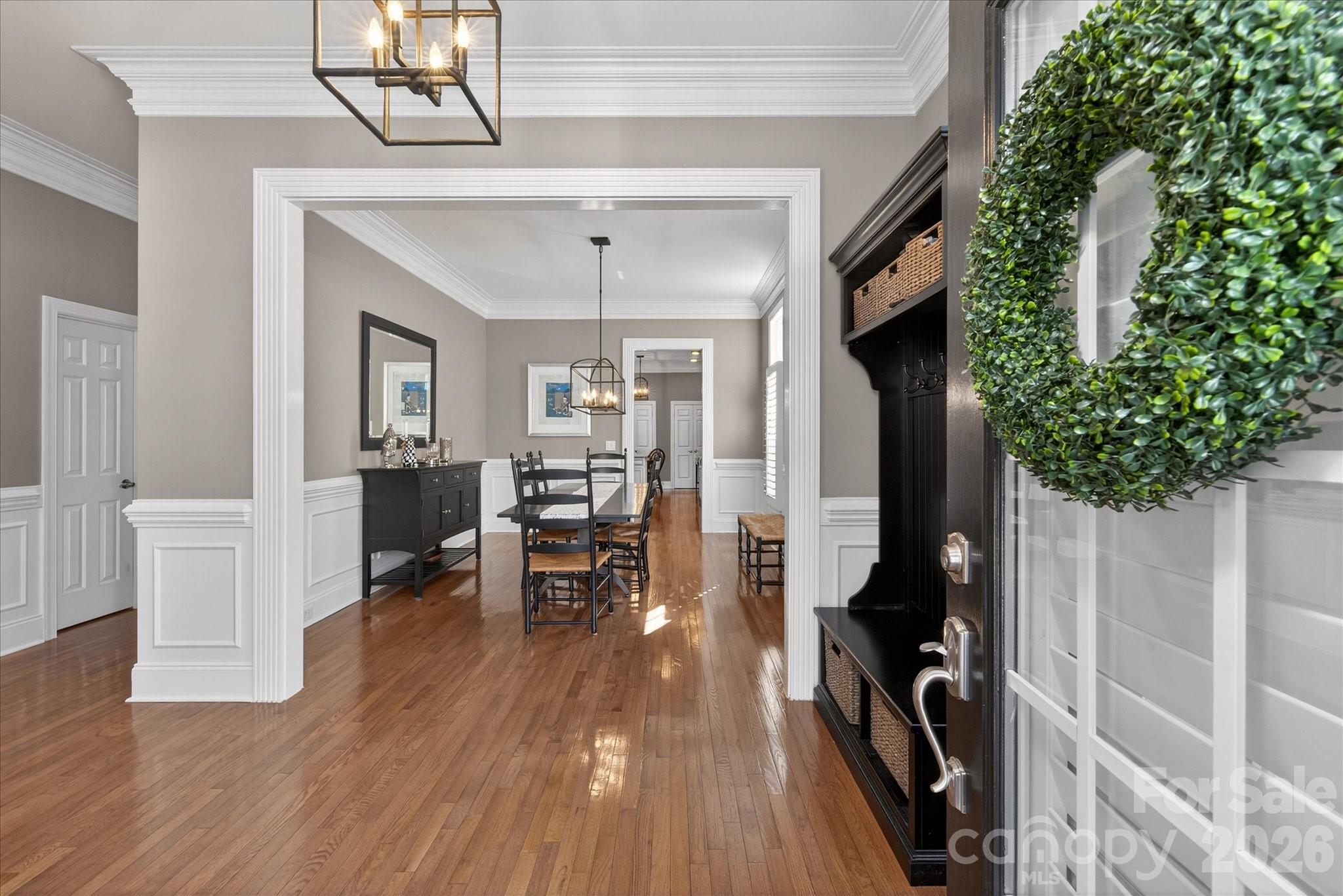 8811 1st Bloom Road Charlotte, NC 28277 - Photo 6 of 48 a view of a livingroom with furniture and a hallway