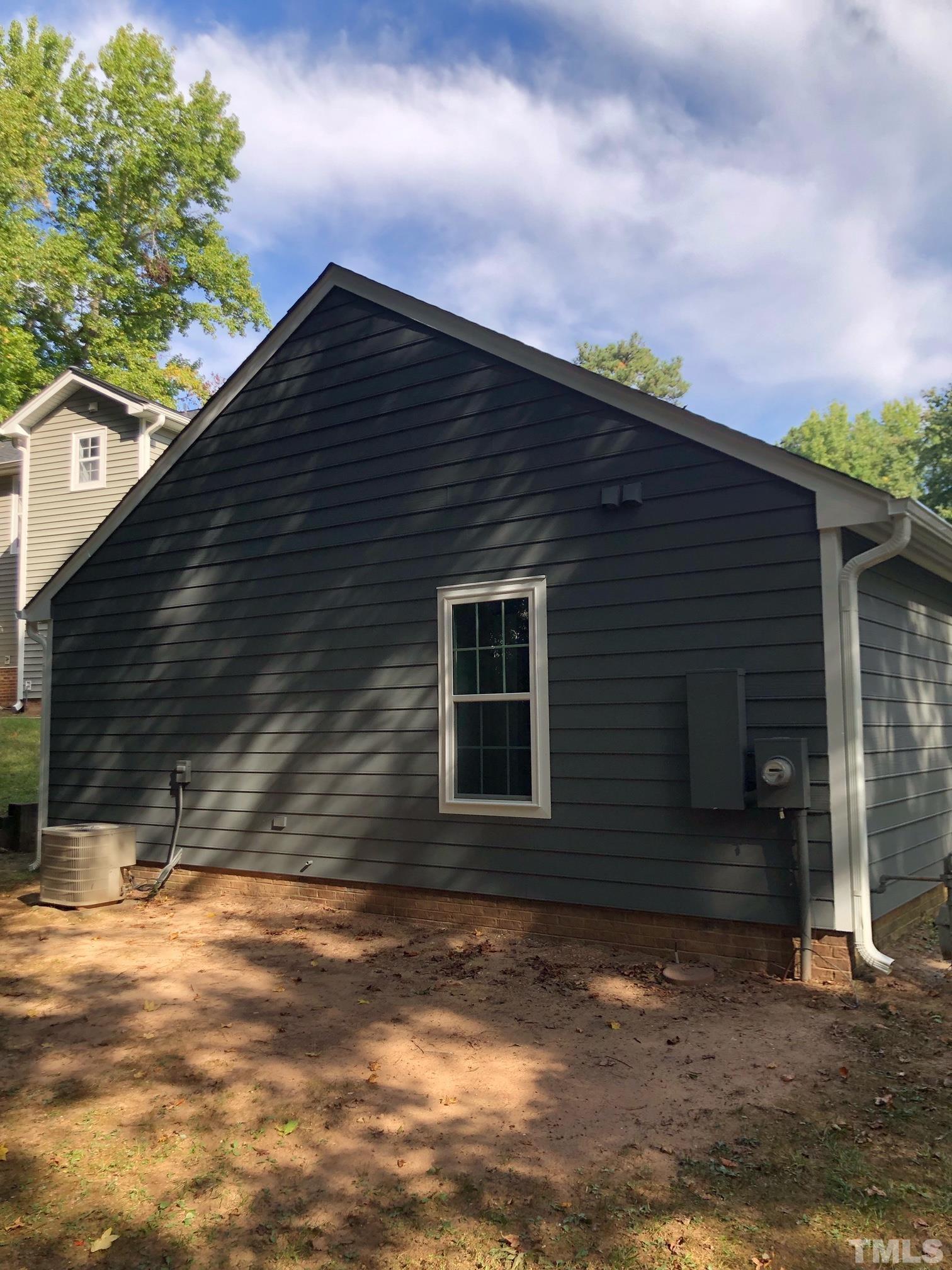 2103 Collier Road Durham, NC 27707 - Photo 4 of 23 a backyard of a house