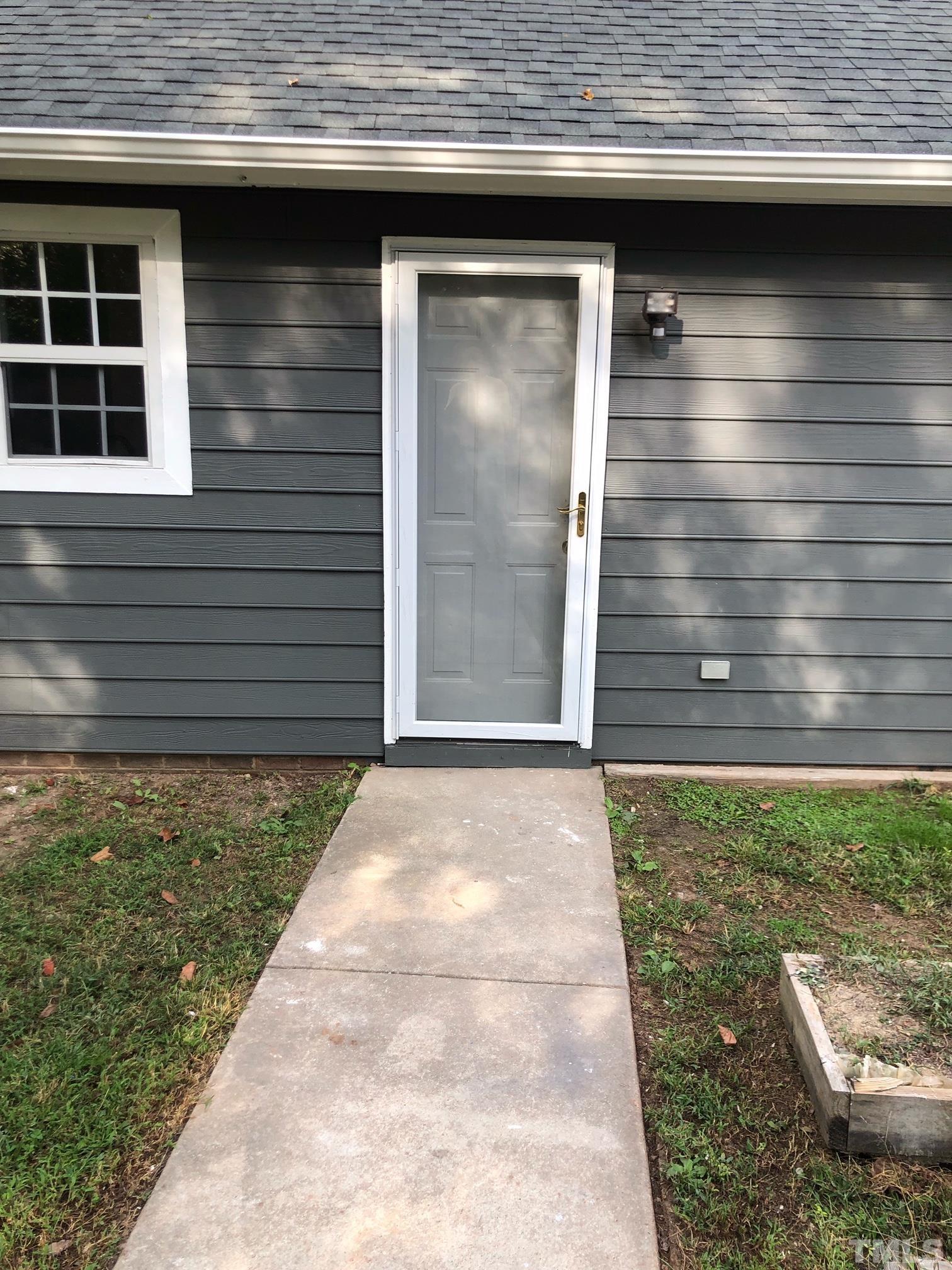 2103 Collier Road Durham, NC 27707 - Photo 6 of 23 a front view of a house