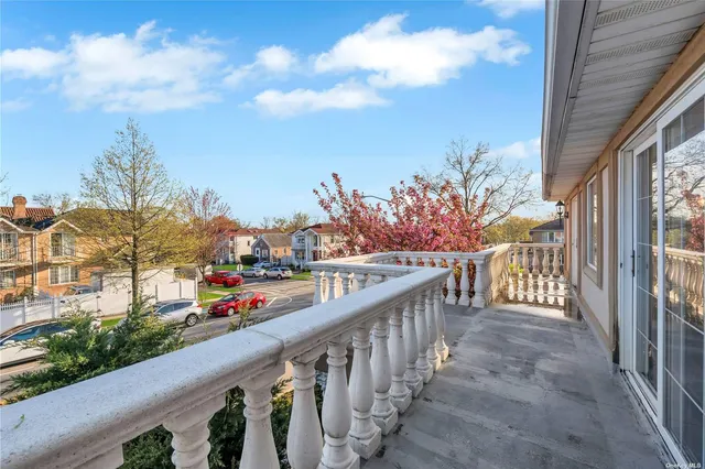a view of a balcony with an outdoor space