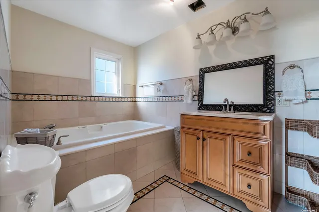 a bath tub sitting next to a window