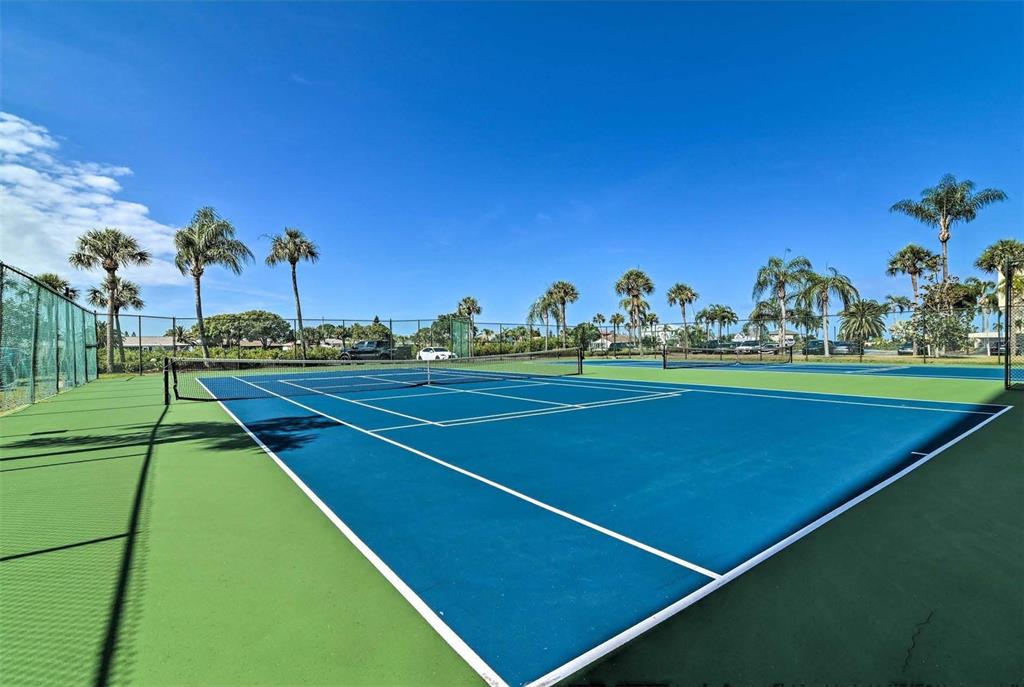 5915 Sea Ranch Drive, Unit 310 Hudson, FL 34667 - Photo 22 of 25 a view of an outdoor space and basketball court