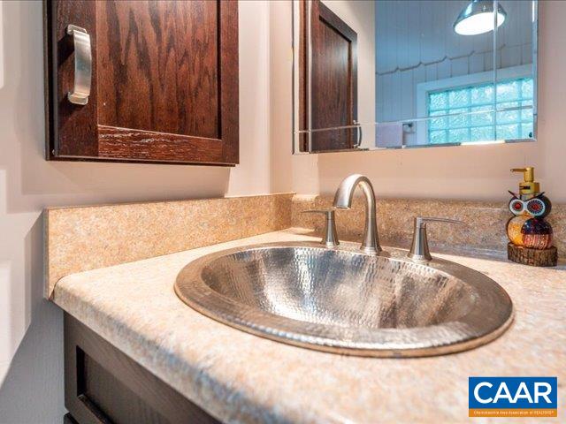 237 Westwood Road Stanardsville, VA 22973 - Photo 21 of 47 a close view of sink and tap