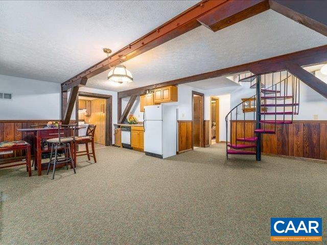 237 Westwood Road Stanardsville, VA 22973 - Photo 24 of 47 a living room with furniture and a table