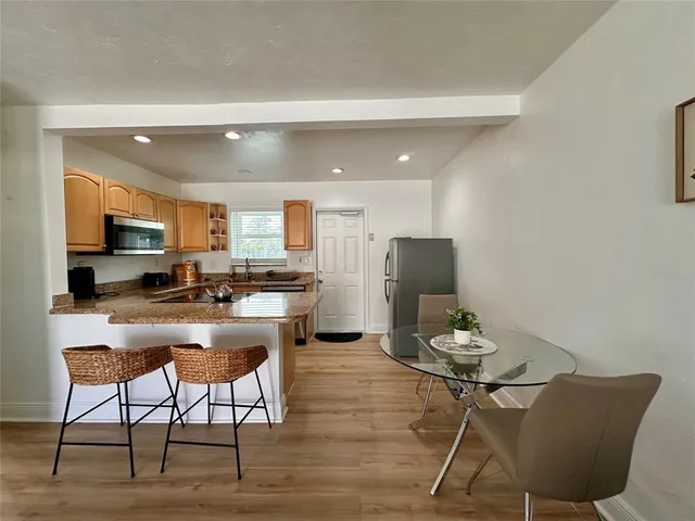 a view of a dining room with furniture