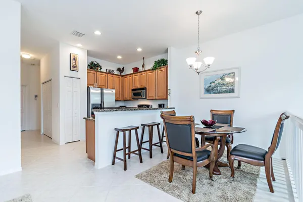 a view of a dining room with furniture