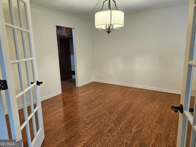a kitchen with a stove and a sink
