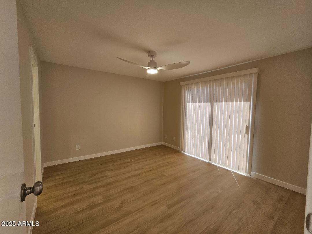 2020 West Union Hills Drive, Unit 116 Phoenix, AZ 85027 - Photo 14 of 28 wooden floor in an empty room