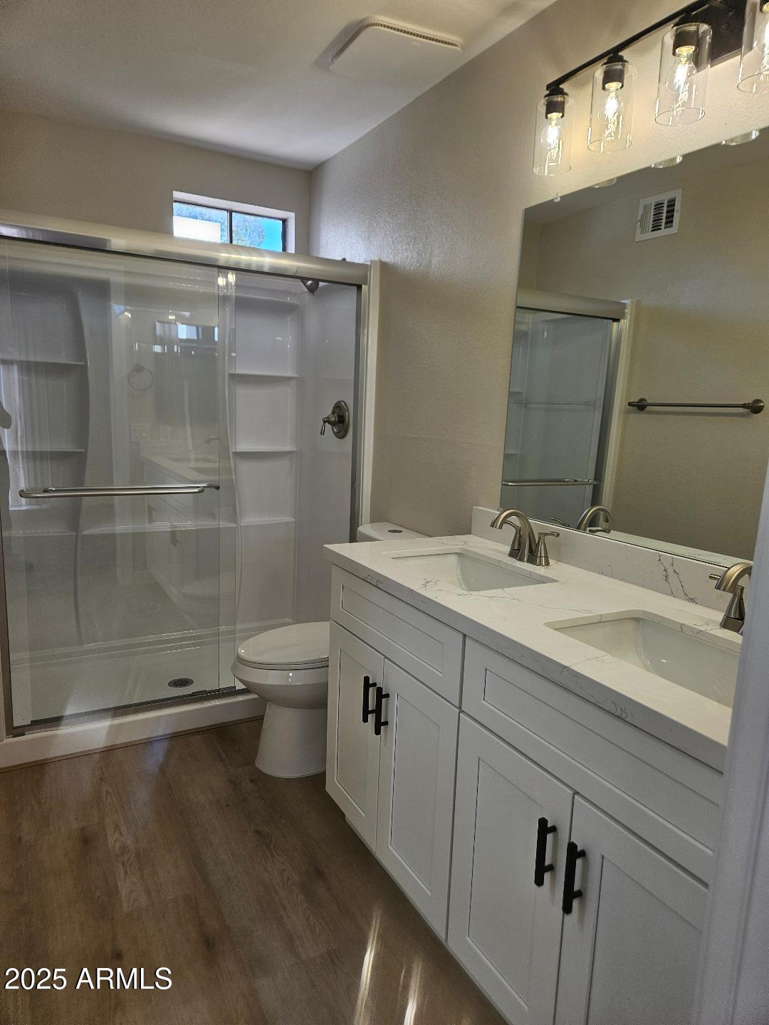 2020 West Union Hills Drive, Unit 116 Phoenix, AZ 85027 - Photo 16 of 28 a bathroom with a sink a toilet and shower