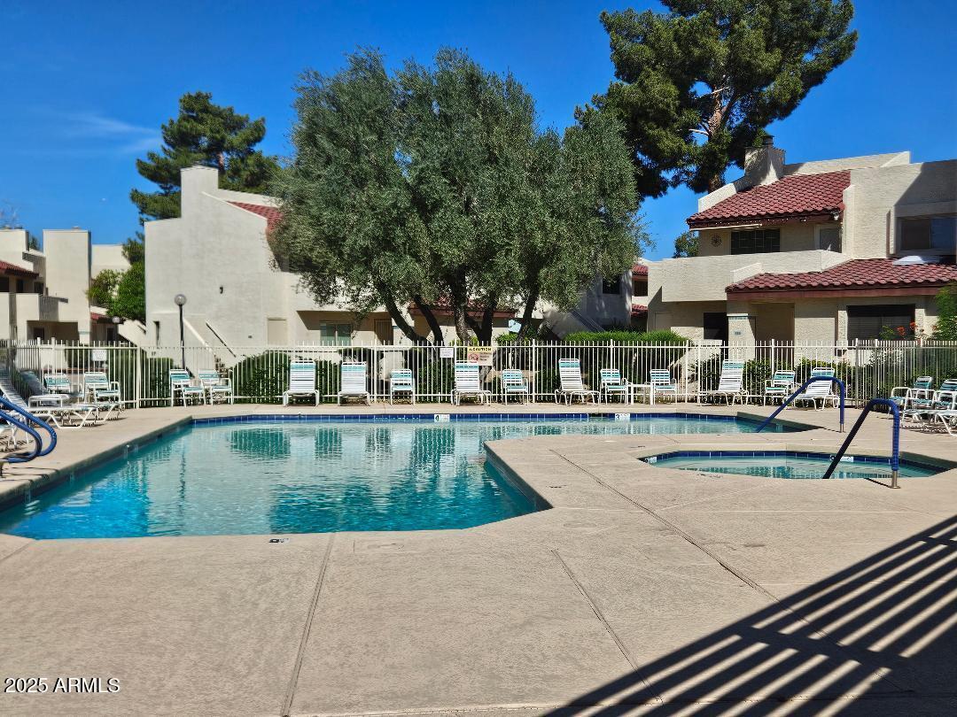 2020 West Union Hills Drive, Unit 116 Phoenix, AZ 85027 - Photo 26 of 28 a view of a swimming pool with a patio