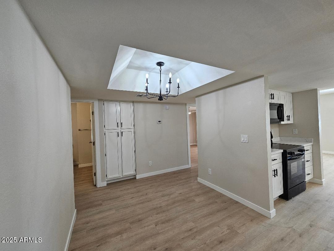 2020 West Union Hills Drive, Unit 116 Phoenix, AZ 85027 - Photo 9 of 28 a view of a kitchen with a sink and a refrigerator
