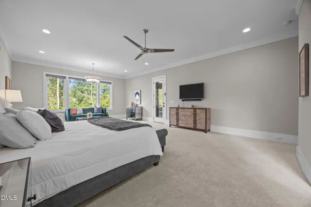 a large bathroom with a double vanity sink a mirror and a bathtub
