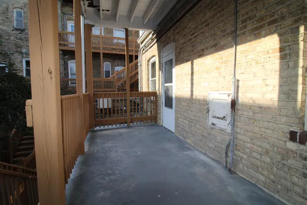 a view of hallway with stairs