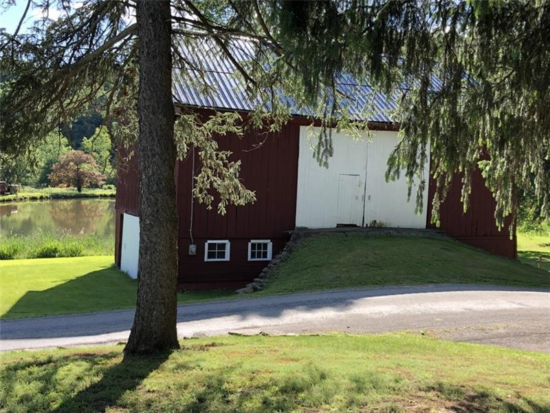 306 Two Mile Run Road Ligonier, PA 15658 - Photo 24 of 25 Barn and Pond