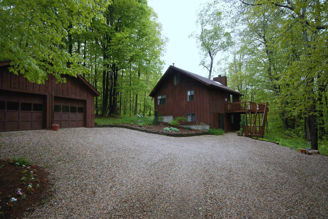 221 Judd Road Otis, MA 01253 - Photo 2 of 23 a view of a house with backyard and tree