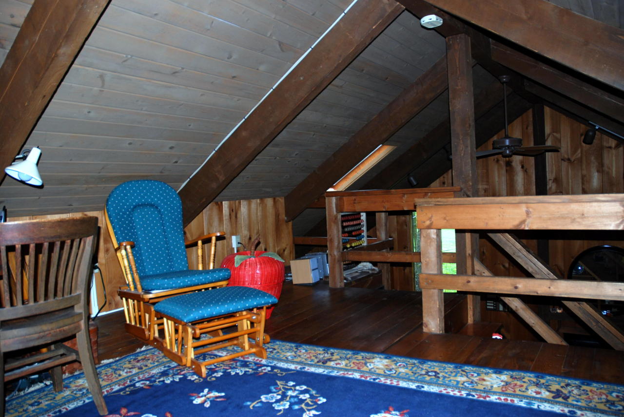 221 Judd Road Otis, MA 01253 - Photo 13 of 23 a backyard of a house with seating space