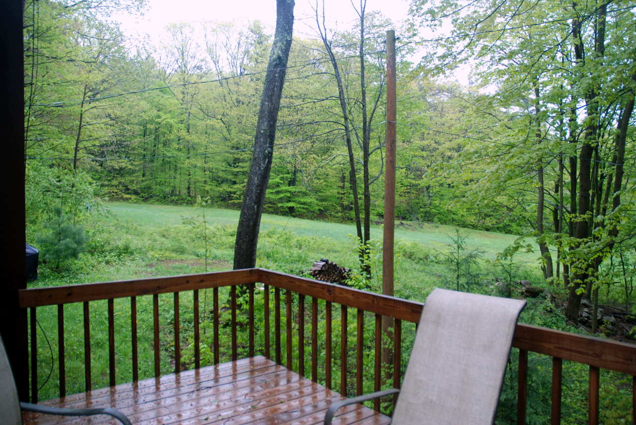 221 Judd Road Otis, MA 01253 - Photo 16 of 23 a view of a wooden deck next to a yard