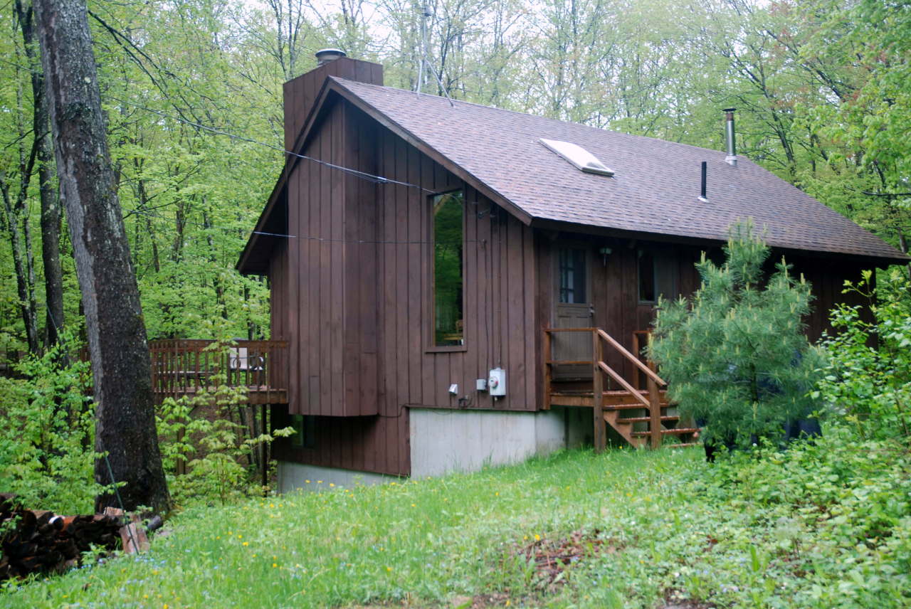 221 Judd Road Otis, MA 01253 - Photo 21 of 23 a view of a barn house with a big yard plants and large trees