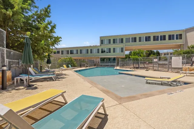 a view of a house with swimming pool