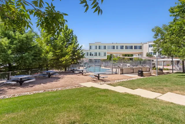 a view of swimming pool with outdoor seating