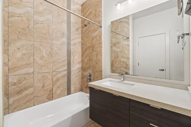 a bathroom with a sink and a bathtub