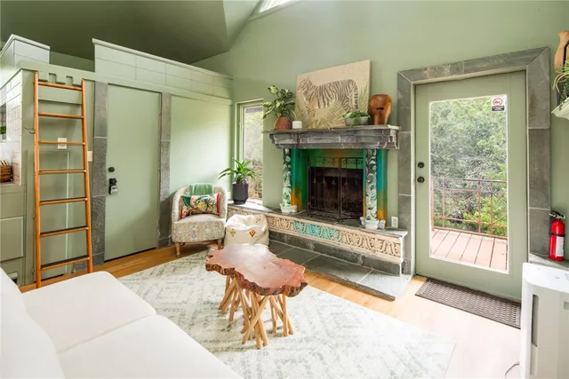 a living room with furniture and a rug