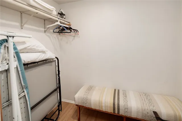 a bedroom with a bed and a blanket