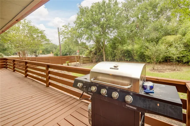 a view of a swimming pool with an outdoor space and seating area
