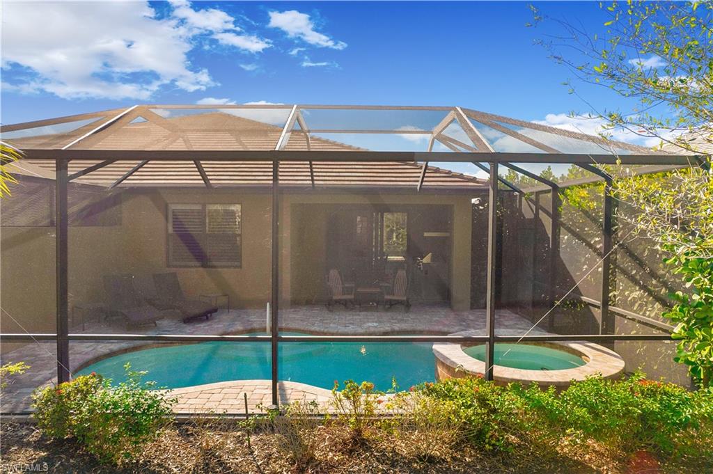 7674 Jacaranda Lane Naples, FL 34114 - Photo 29 of 45 a view of a small pool