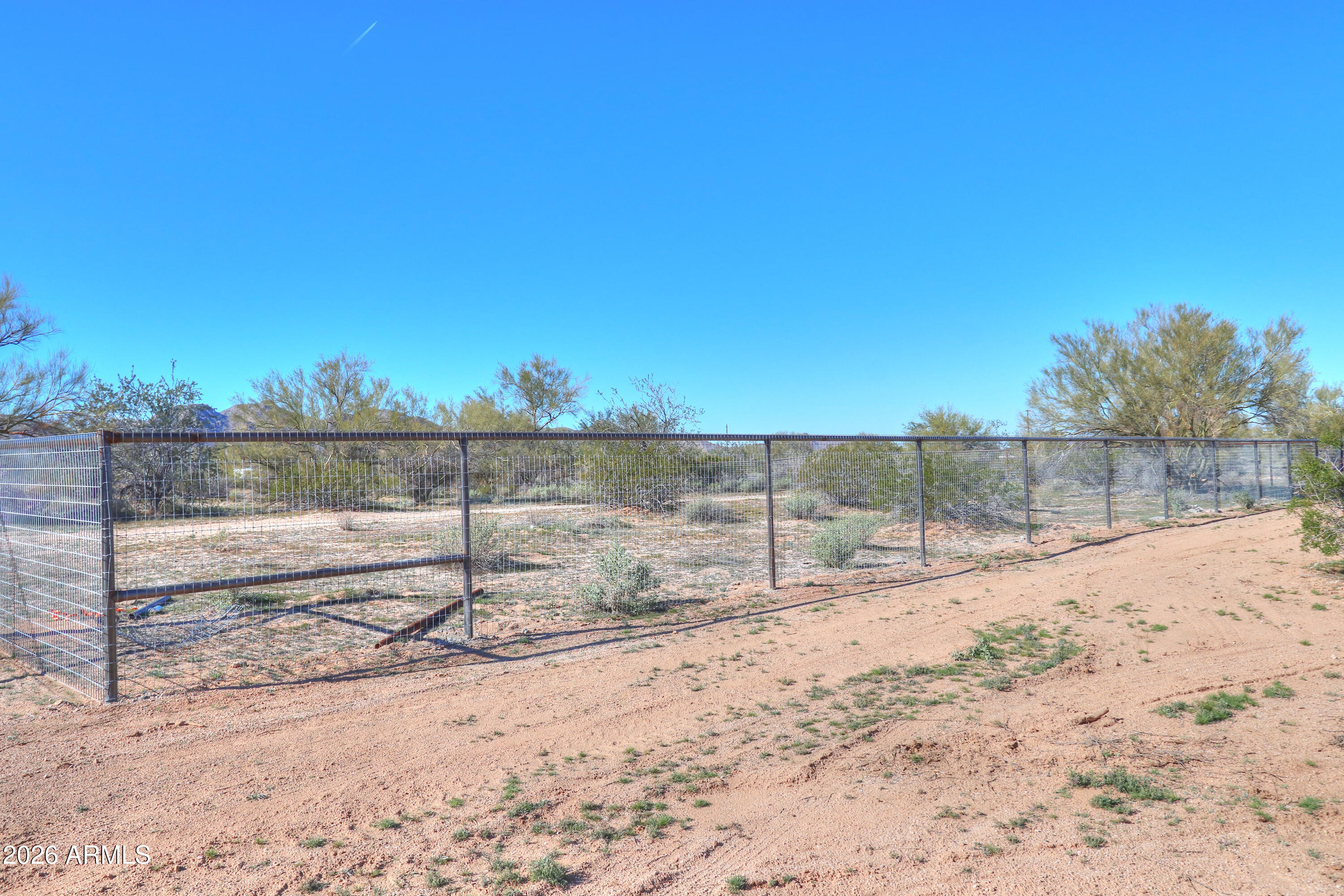 4 South Rincon Road, Unit 58 Maricopa, AZ 85139 - Photo 2 of 20 a view of a yard with a snow