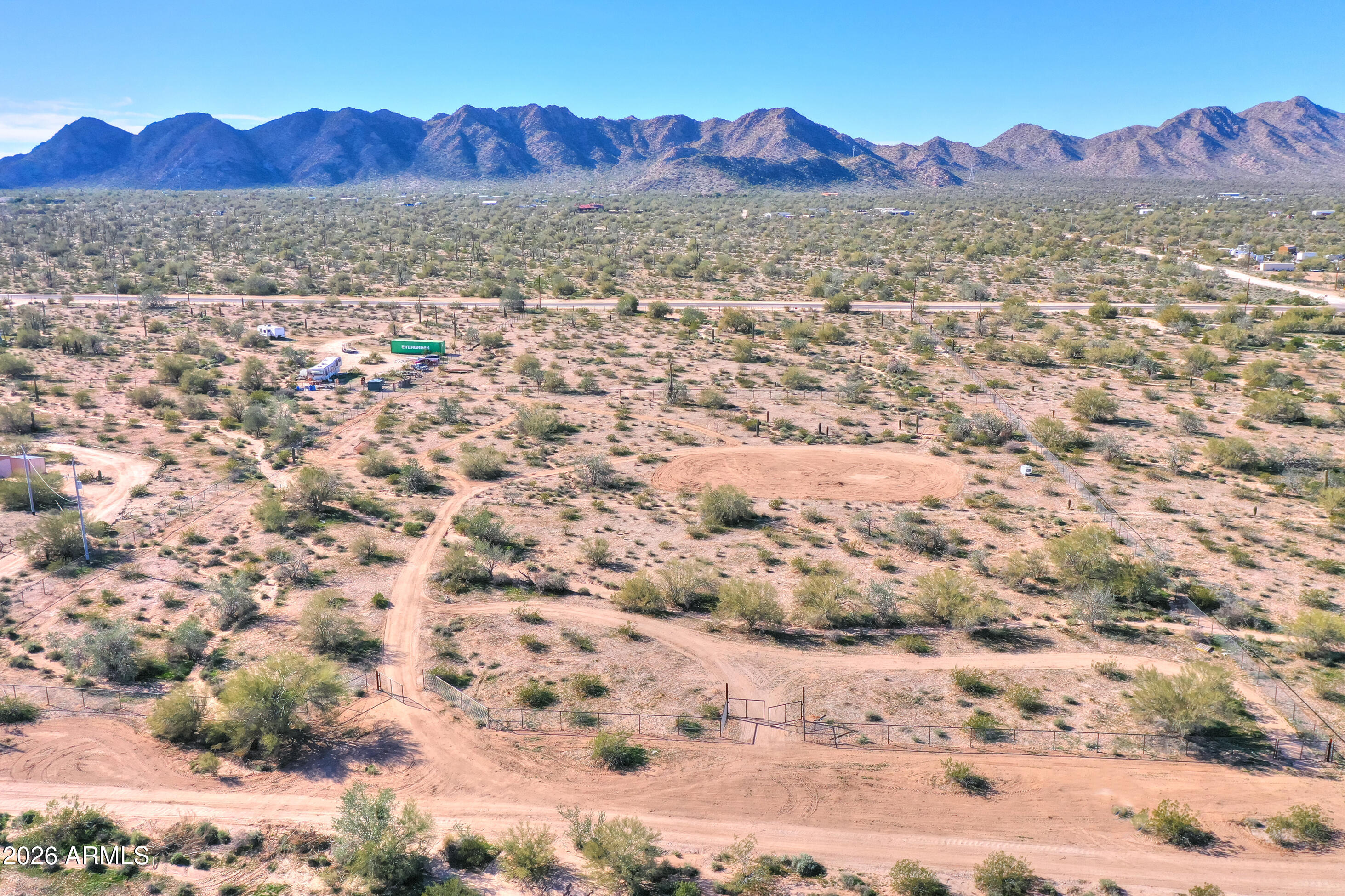 4 South Rincon Road, Unit 58 Maricopa, AZ 85139 - Photo 9 of 20 a view of a yard with a mountain