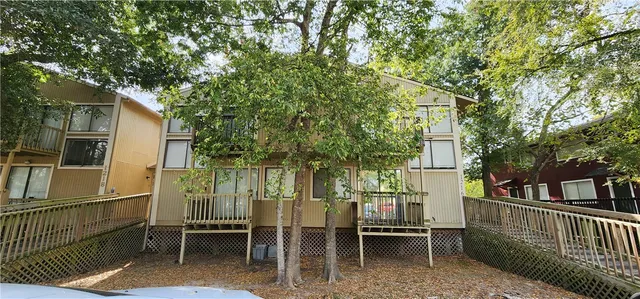 a view of chair and table in the balcony