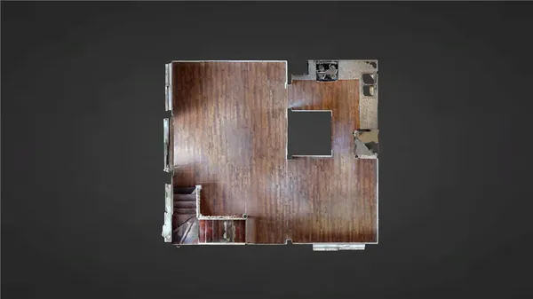 a balcony with table and chairs and wooden fence