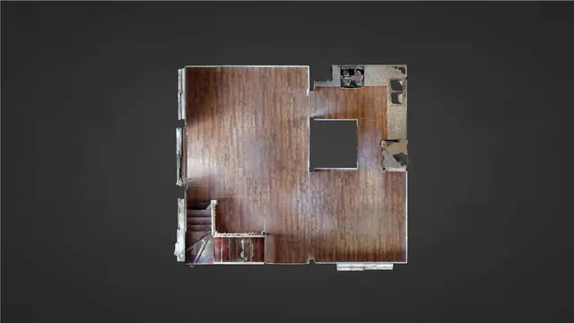 a balcony with table and chairs and wooden fence